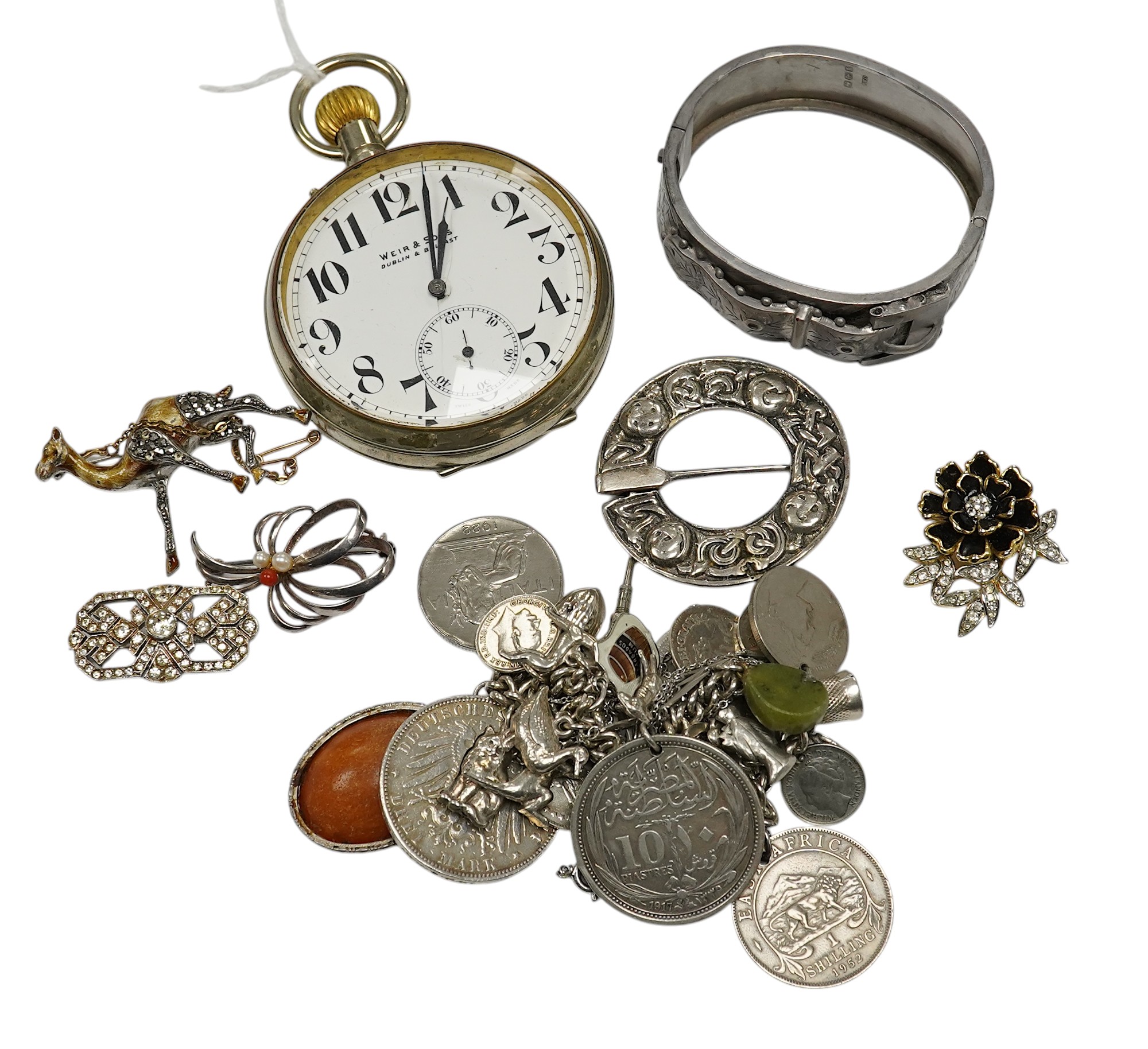 Assorted jewellery etc. including a silver bangle, a white metal Celtic style brooch and a Weir & Son nickel cased pocket watch. Condition - poor to fair to good.